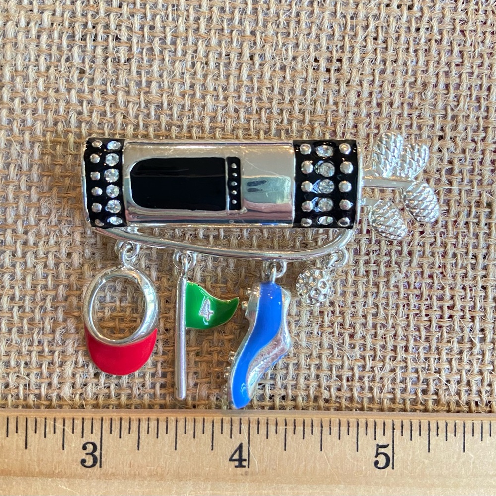 Liz Claiborne golf bag pin brooch, silvertone with rhinestones dangling charms